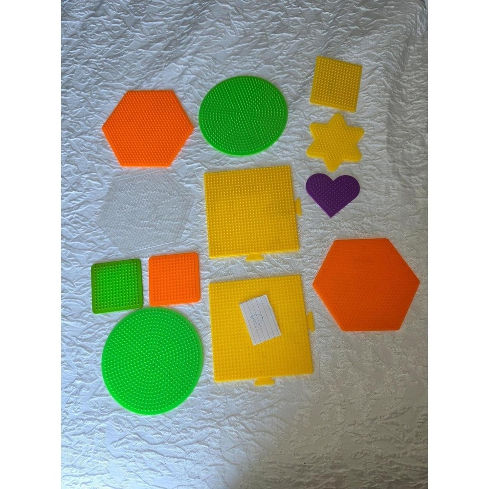 Lot D Perler bead pegboards in various shapes and bright colors